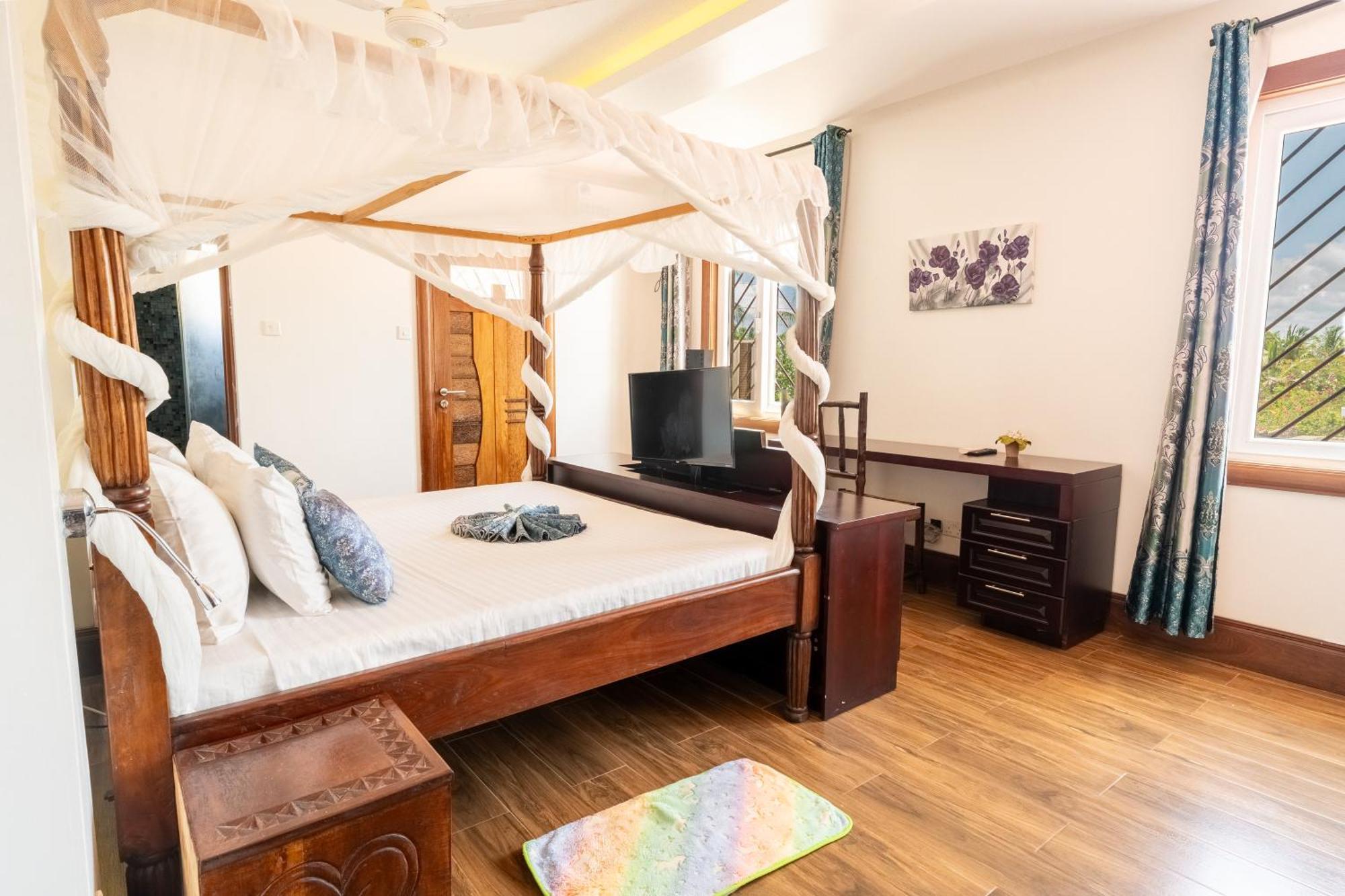 Queens Chateau Boutique Villa Praia de Diani Exterior foto